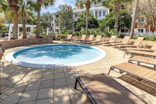 9200 Baytowne Wharf Blvd Unit 441, Miramar Beach, FL 32550 - swimming pool featuring a patio area and fence