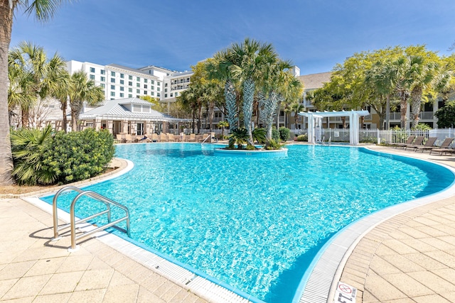 9200 Baytowne Wharf Blvd Unit 441, Miramar Beach, FL 32550 - community pool featuring a pergola, fence, and a patio area