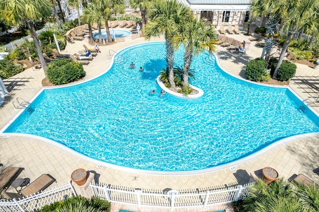 9200 Baytowne Wharf Blvd Unit 441, Miramar Beach, FL 32550 - community pool with fence and a patio area