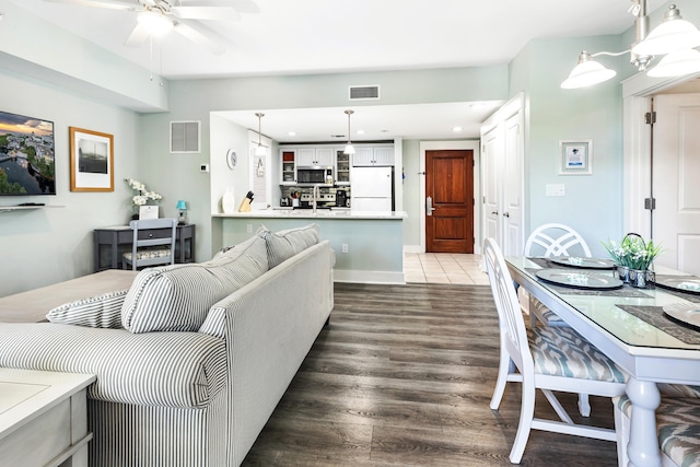 9200 Baytowne Wharf Blvd Unit 441, Miramar Beach, FL 32550 - living area with dark wood-style floors, recessed lighting, and a ceiling fan
