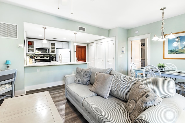 9200 Baytowne Wharf Blvd Unit 441, Miramar Beach, FL 32550 - living room with dark wood-style floors, recessed lighting, and baseboards