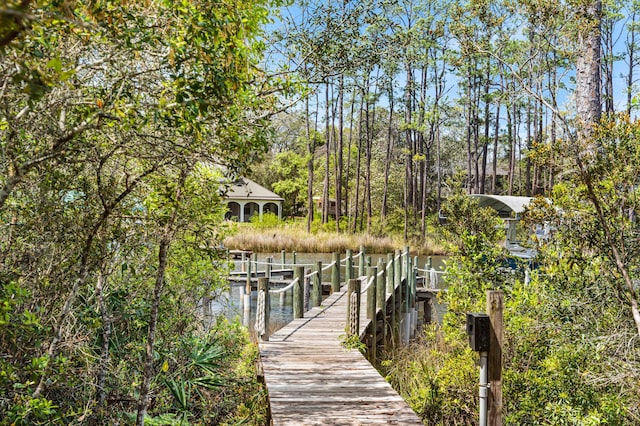 135 Bayou Point Dr, Santa Rosa Beach, FL 32459 - view of dock featuring a water view