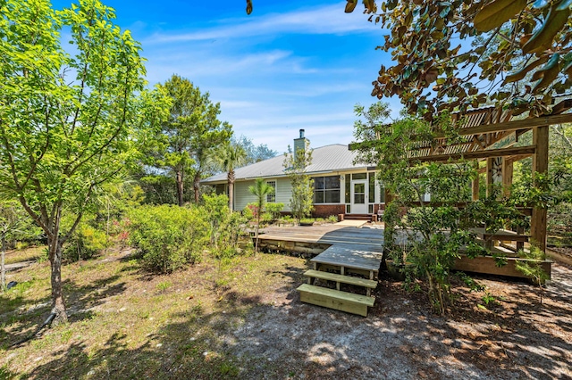 135 Bayou Point Dr, Santa Rosa Beach, FL 32459 - view of yard featuring a sunroom and a deck