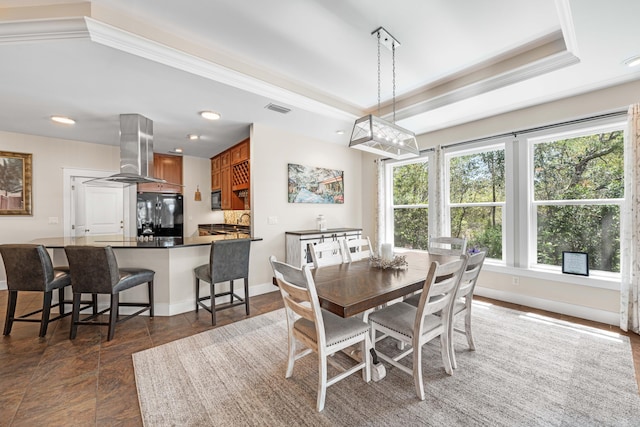 135 Bayou Point Dr, Santa Rosa Beach, FL 32459 - dining space featuring a tray ceiling, visible vents, baseboards, and recessed lighting