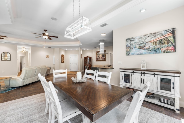 135 Bayou Point Dr, Santa Rosa Beach, FL 32459 - dining room featuring recessed lighting, a tray ceiling, visible vents, dark tile patterned floors, and ceiling fan