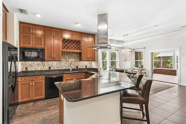 135 Bayou Point Dr, Santa Rosa Beach, FL 32459 - kitchen with tasteful backsplash, a sink, island range hood, black appliances, and visible vents