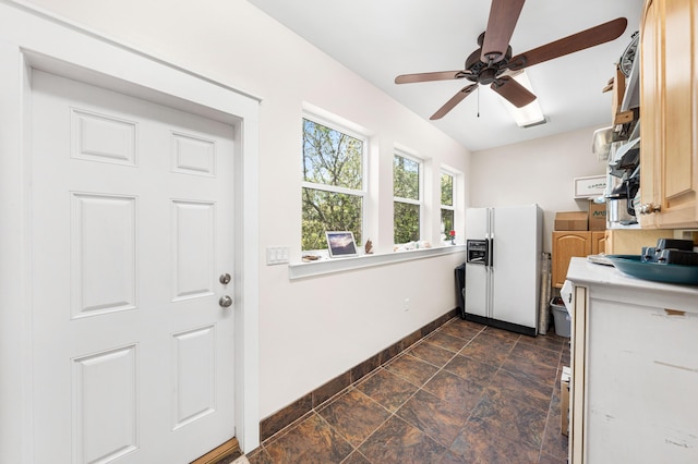 135 Bayou Point Dr, Santa Rosa Beach, FL 32459 - washroom featuring baseboards, a ceiling fan, and stone finish floor