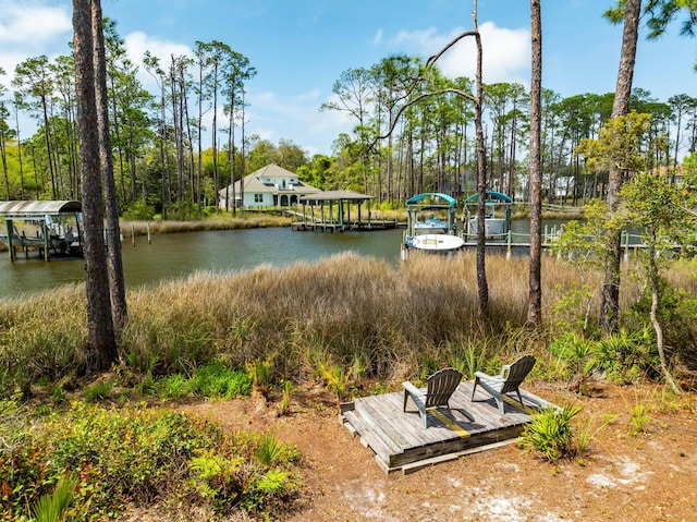 135 Bayou Point Dr, Santa Rosa Beach, FL 32459 - exterior space featuring boat lift and a water view