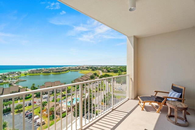 balcony featuring a water view