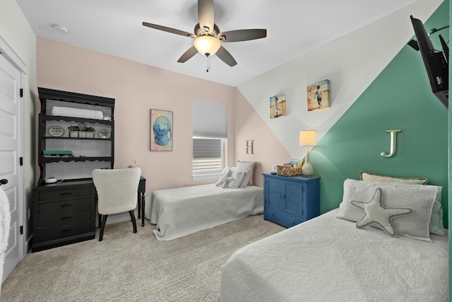 carpeted bedroom featuring a ceiling fan