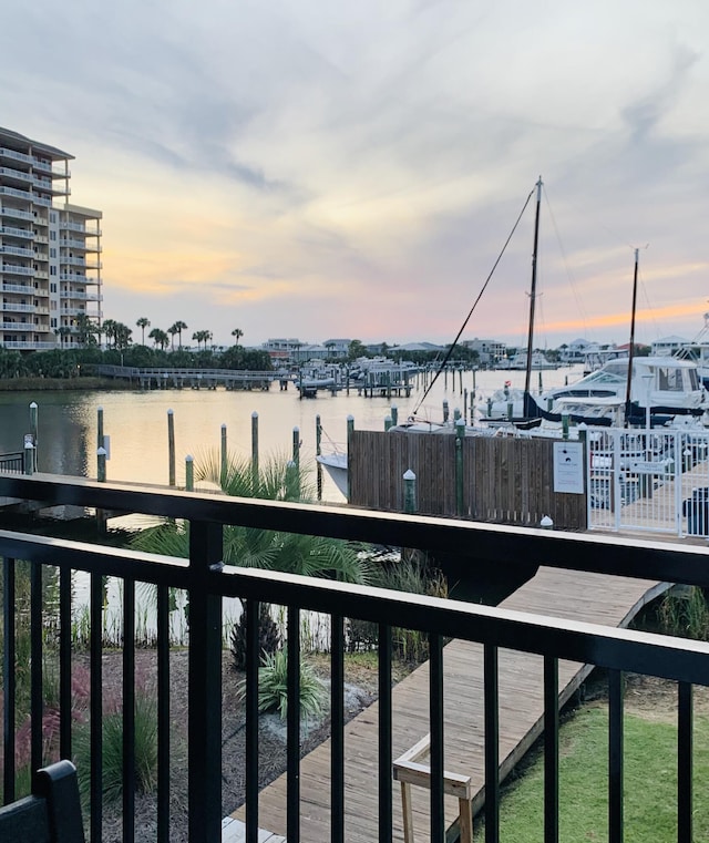 property view of water with a dock