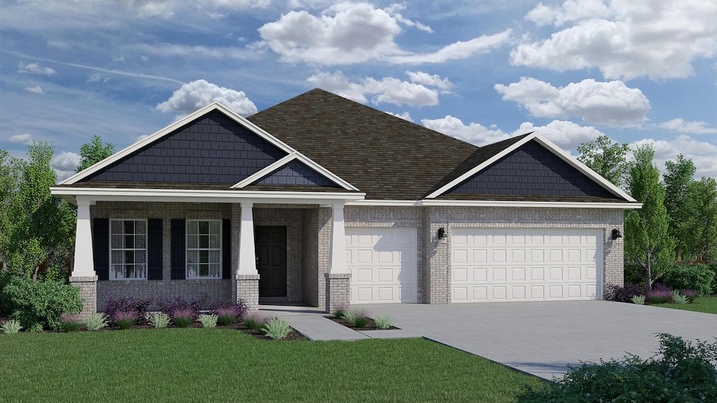 53 E Fawn Run, Freeport, FL 32439 - craftsman-style house with brick siding, an attached garage, a front lawn, and driveway