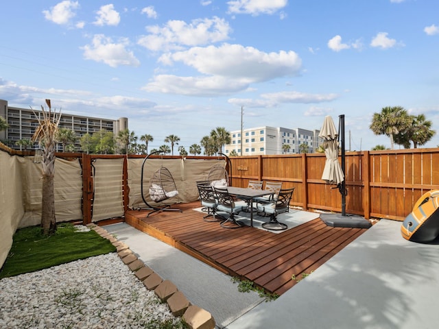 356 Billfish Ave Unit 4, Fort Walton Beach, FL 32548 - wooden terrace with fence and outdoor dining area