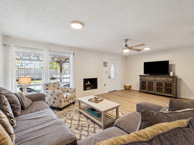 356 Billfish Ave Unit 4, Fort Walton Beach, FL 32548 - living room featuring plenty of natural light, a textured ceiling, and ceiling fan