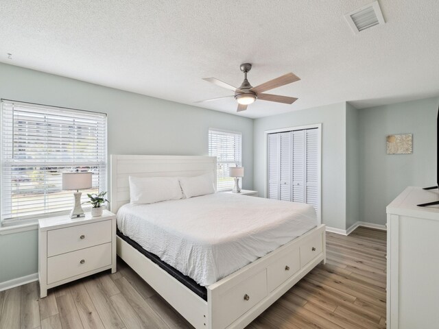 356 Billfish Ave Unit 4, Fort Walton Beach, FL 32548 - bedroom with a closet, visible vents, light wood finished floors, and baseboards