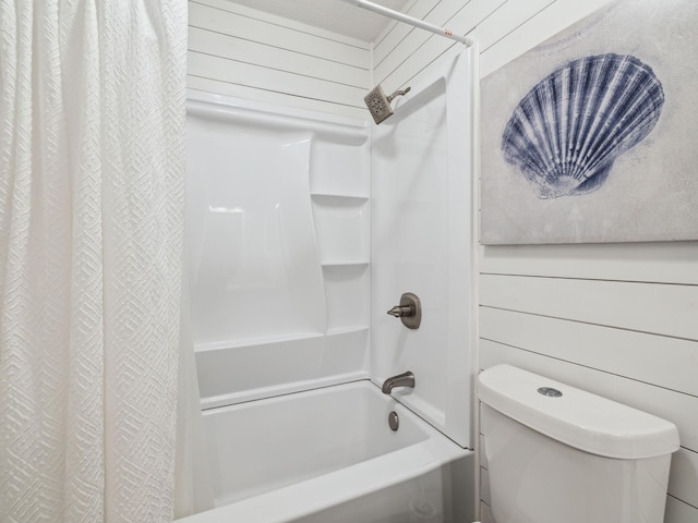 356 Billfish Ave Unit 4, Fort Walton Beach, FL 32548 - bathroom with shower / tub combo, toilet, and wood walls