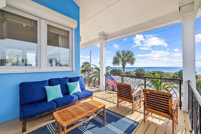exterior space featuring a water view and an outdoor hangout area