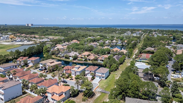 bird's eye view with a residential view and a water view