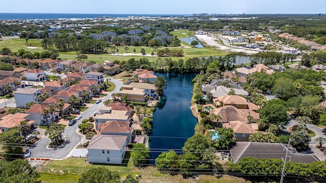 birds eye view of property with a water view and a residential view