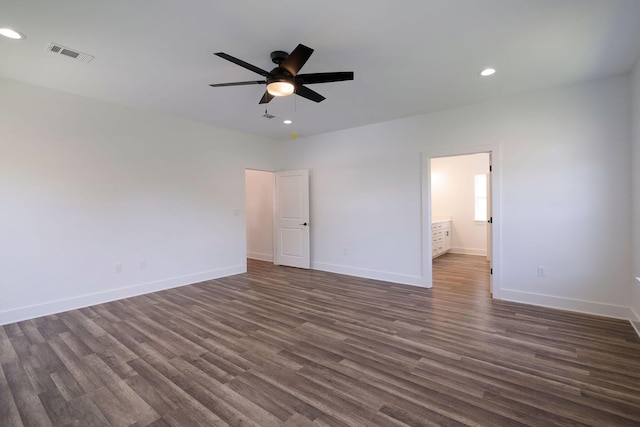 unfurnished bedroom featuring visible vents, recessed lighting, and dark wood-style floors
