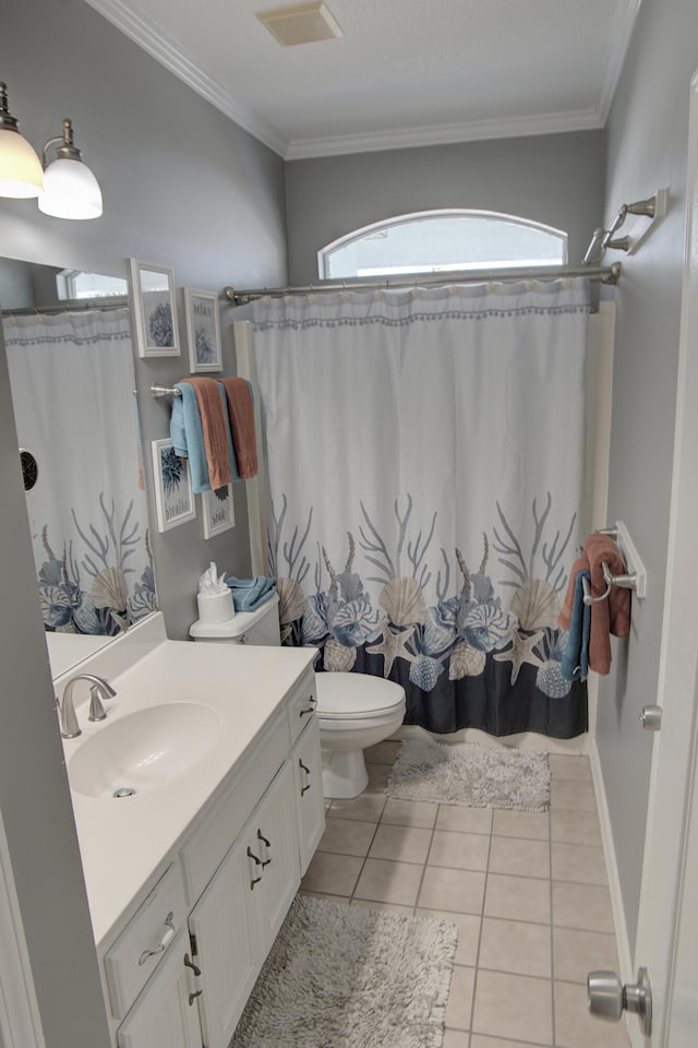 38 Aquamarine Cv, Miramar Beach, FL 32550 - full bathroom with tile patterned floors, toilet, visible vents, vanity, and ornamental molding