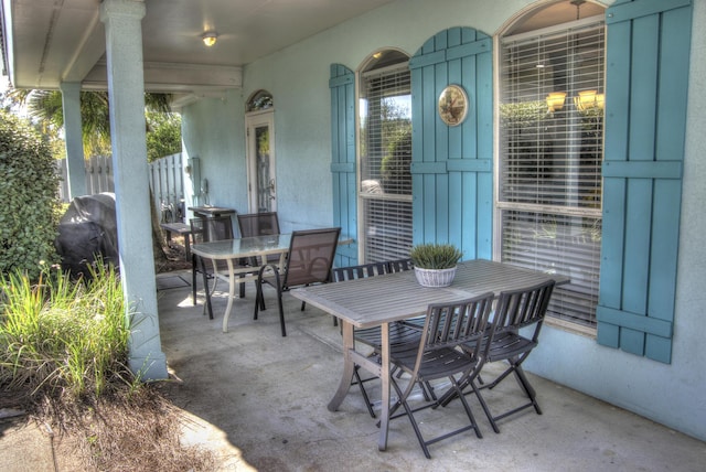 38 Aquamarine Cv, Miramar Beach, FL 32550 - view of patio with fence, outdoor dining area, and area for grilling