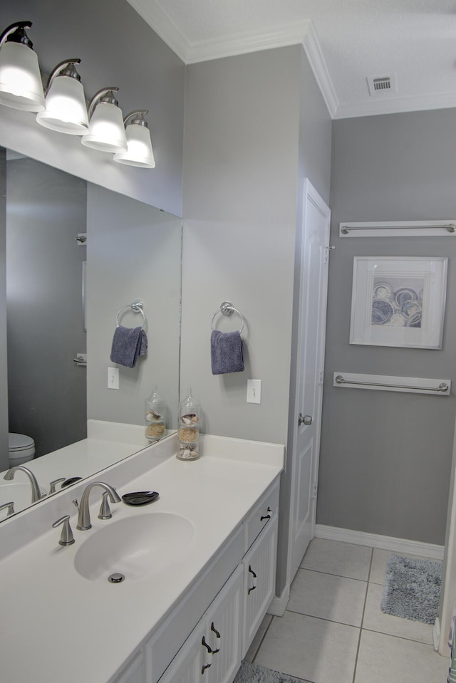 38 Aquamarine Cv, Miramar Beach, FL 32550 - bathroom featuring visible vents, tile patterned floors, vanity, and ornamental molding