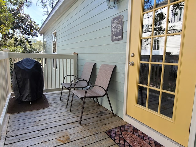 wooden terrace with grilling area