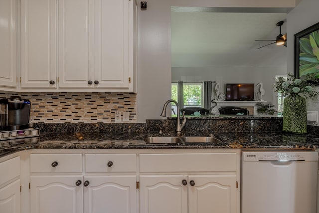 kitchen with decorative backsplash, dishwasher, white cabinetry, and ceiling fan