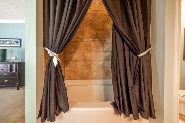 bathroom with toilet and shower / bathtub combination with curtain