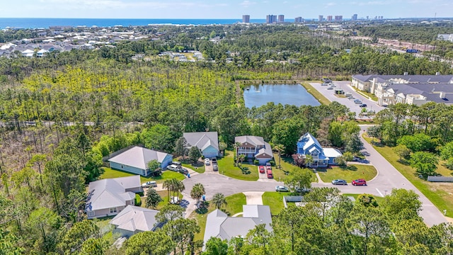 birds eye view of property with a residential view and a water view