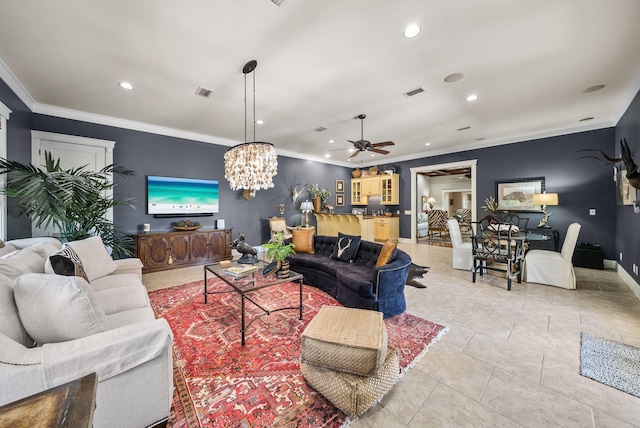 living area featuring recessed lighting, visible vents, crown molding, and ceiling fan with notable chandelier