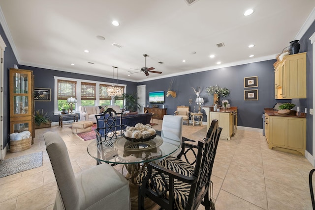dining space featuring recessed lighting, crown molding, baseboards, and ceiling fan
