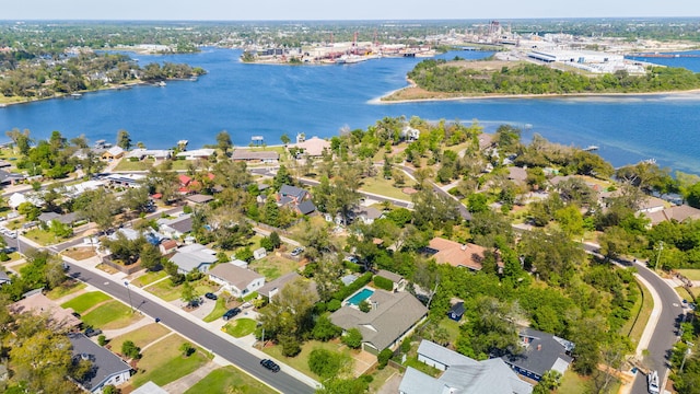 bird's eye view with a residential view and a water view