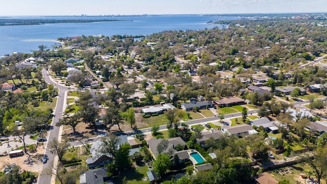 birds eye view of property featuring a residential view and a water view