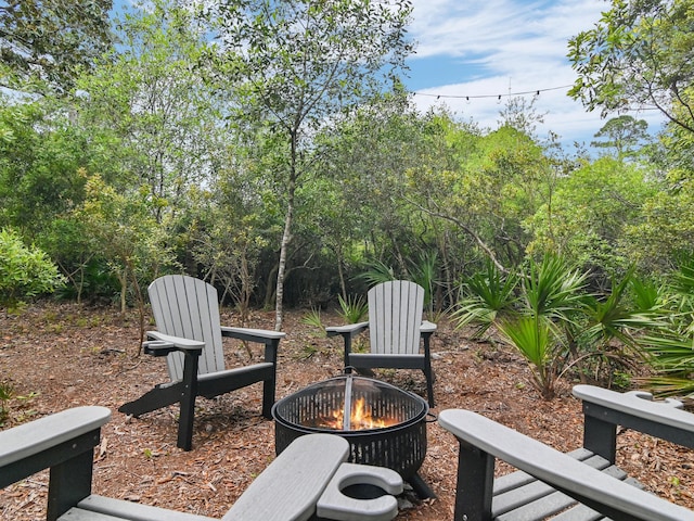 105 Greenbriar Ln, Santa Rosa Beach, FL 32459 - view of yard featuring an outdoor fire pit