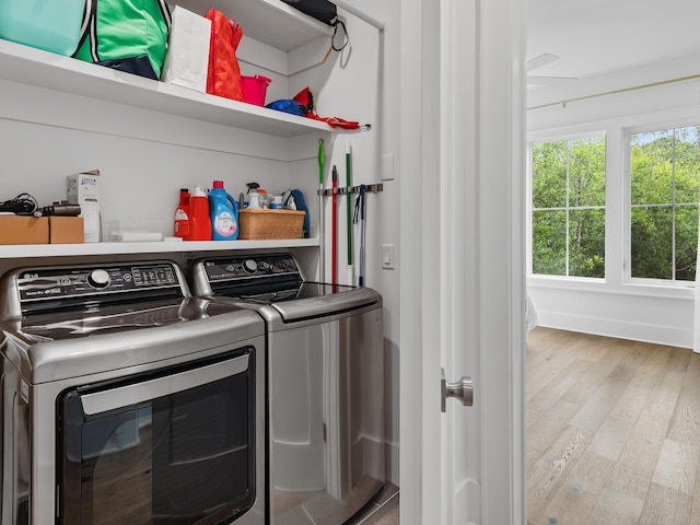 105 Greenbriar Ln, Santa Rosa Beach, FL 32459 - washroom featuring wood finished floors and washer and dryer
