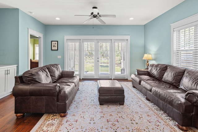 living room featuring plenty of natural light, a ceiling fan, wood finished floors, and recessed lighting