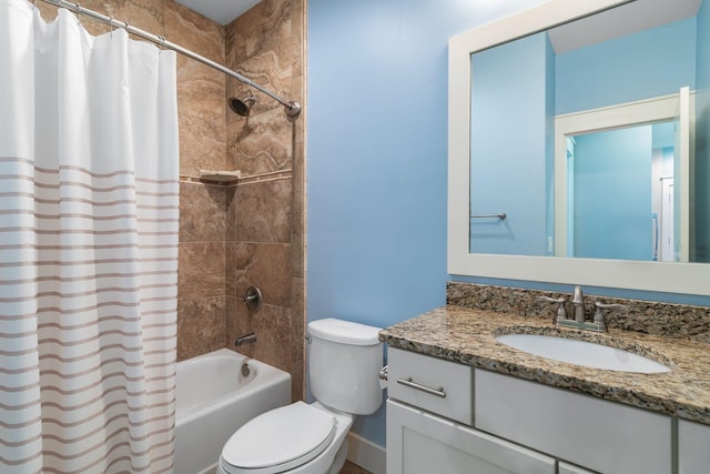 full bath featuring toilet, vanity, and shower / bath combination with curtain
