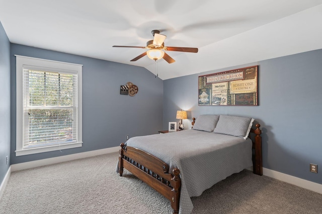 bedroom featuring lofted ceiling, carpet floors, a ceiling fan, and baseboards