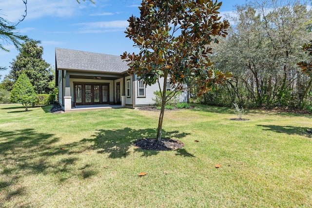 view of yard with ceiling fan