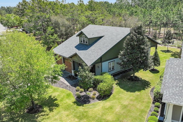 aerial view with a wooded view