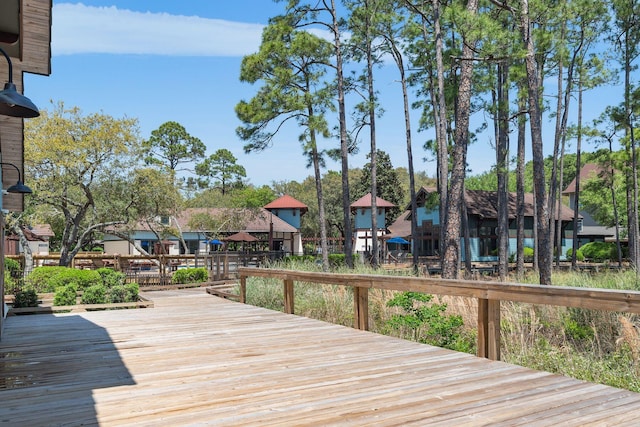 wooden terrace with a residential view