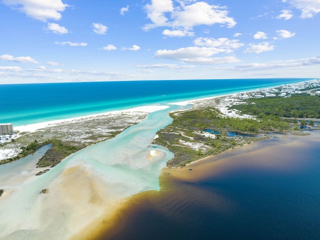 drone / aerial view featuring a view of the beach and a water view