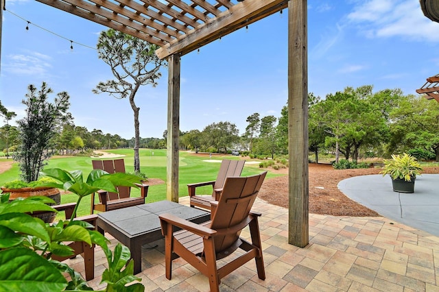 view of patio featuring a pergola and view of golf course