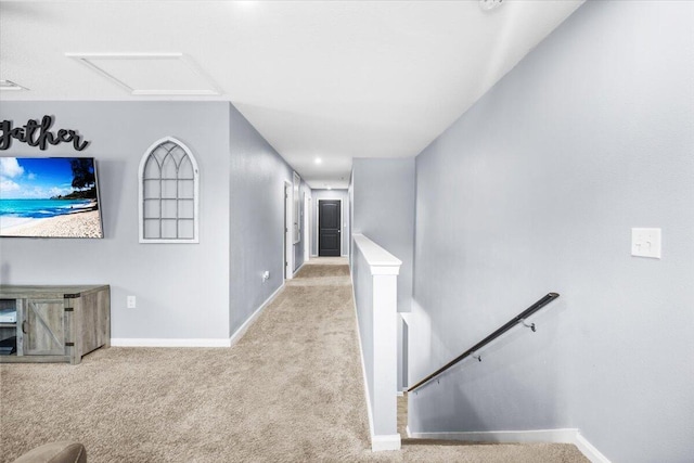 3129 Partridge Dr, Crestview, FL 32539 - hall with an upstairs landing, baseboards, carpet flooring, and attic access