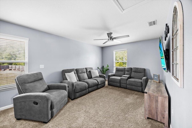 3129 Partridge Dr, Crestview, FL 32539 - living area with carpet flooring, baseboards, and a ceiling fan
