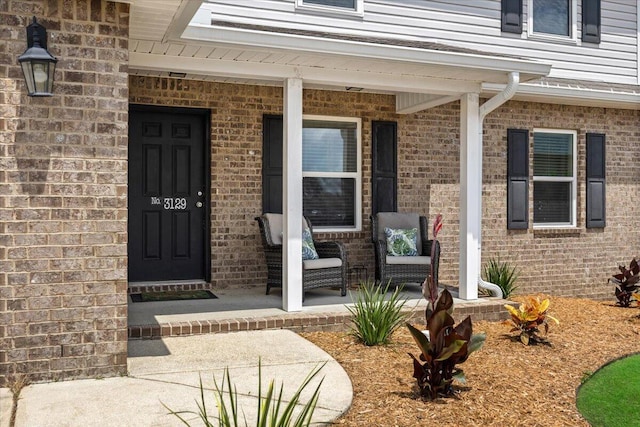 3129 Partridge Dr, Crestview, FL 32539 - entrance to property featuring a porch and brick siding