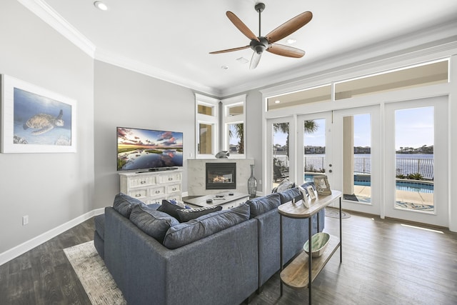 4720 Rendezvous Cv, Destin, FL 32541 - living area featuring ceiling fan, recessed lighting, ornamental molding, a glass covered fireplace, and dark wood finished floors