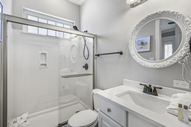 4720 Rendezvous Cv, Destin, FL 32541 - full bath with a stall shower, toilet, and vanity